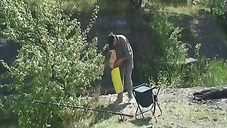 Horny bitch fucks a detach from at the fishing lake